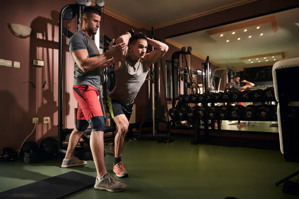 Standing Single-Arm Shoulder-High Triceps Extension